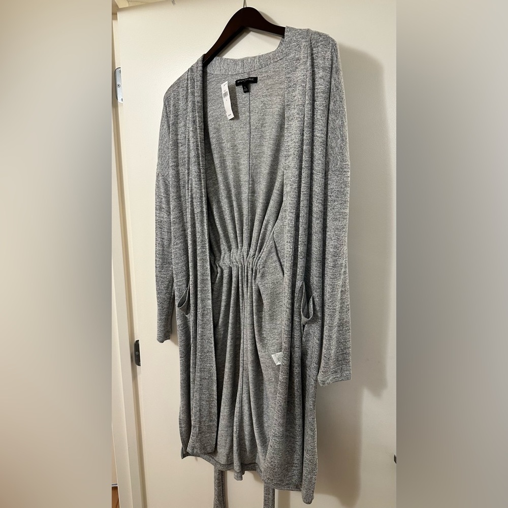 Brand New Lightweight sweater with belt.
